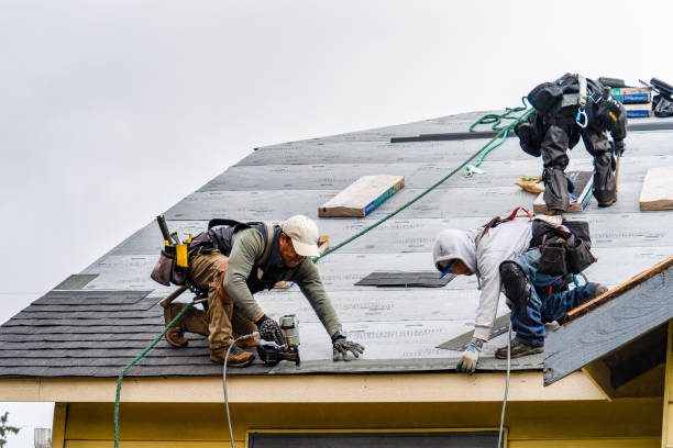 Professional Gutter Installation technician working in Lindsay, CA